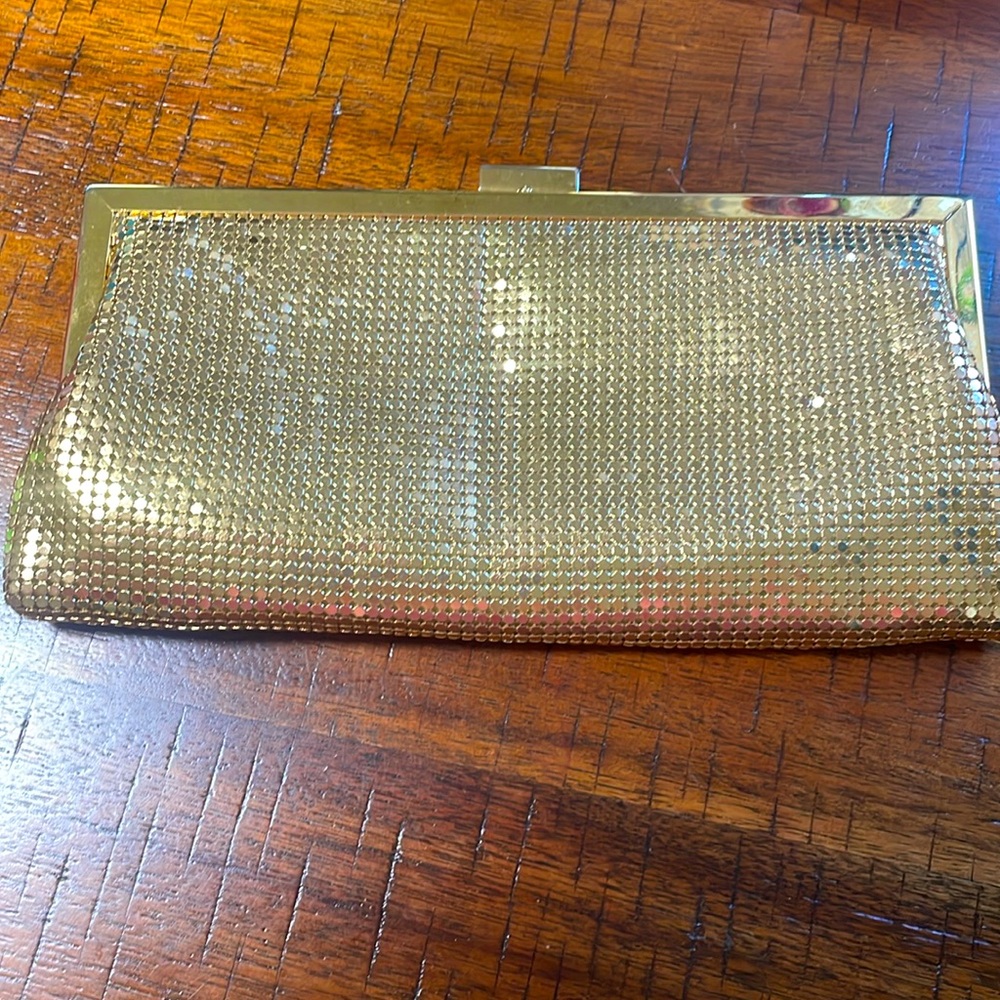 Valerie Steven’s gold clutch with chain